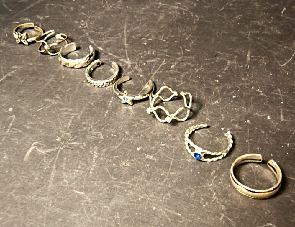 1953.  Lot of 8 Adjustable Silver Tone Toe Rings